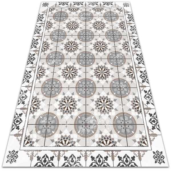 Alfombra vinílica Ruedas en flor