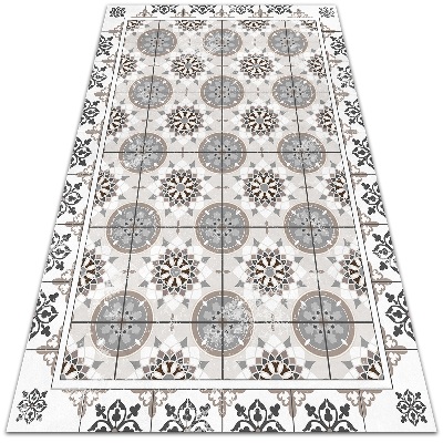 Alfombra vinílica Ruedas en flor